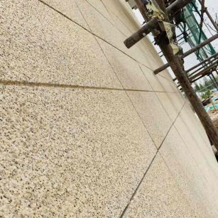 六盘水 黄金麻花岗岩荔枝面外墙干挂石材效果示例